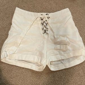 beach shorts with tie front and buckles